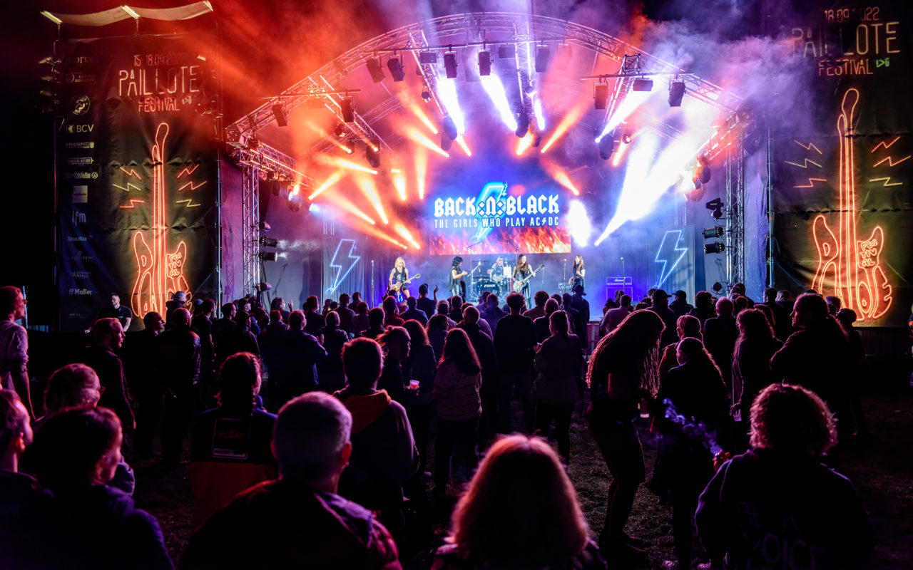 Festival crowd at sunset